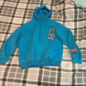 Blue Quarter-Zip Sweater with Graphic Detail